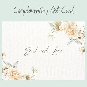 May include: A white gift card with a floral design and the text "Complimentary Gift Card" and "Sent with Love".