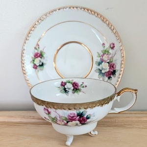 Japanese Hand Painted Floral Tri-Footed Guilded Teacup & Saucer - Vintage and So Pretty!