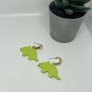 Lime green dinosaurs on a gold huggie stud earring | polymer clay earrings