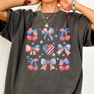 Camiseta de cerezas con colores cómodos, camiseta de cerezas con lazo coqueto de EE. UU. para el 4 de julio, camiseta del Día de los Caídos en Estados Unidos, camiseta patriótica de la Independencia de EE. UU.