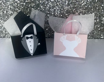 Dolls wedding gift bags. 1 black 1 pink with tissue paper. Dolls Wedding accessories dolls shopping bags