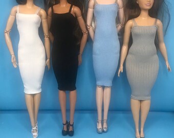 4 dolls tight fitting dresses. Dolls footwear. Dolls full outfit.