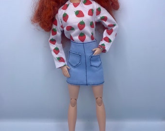 Dolls full outfit. Dolls blue jean skirt long sleeve strawberry pattern top with red shoes
