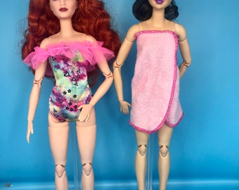 4pc dolls beachwear. 1 dolls swimsuits/Bikini 1 dolls towels 1 dolls headbands and a pair of dolls shoes summer suits for dolls