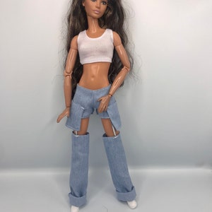 2pc blue shorts and white bra top. With trainers Punk rock style dolls outfit