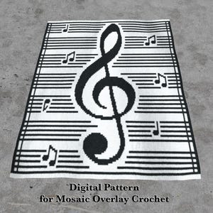 May include: Black and white crochet pattern featuring a treble clef on a musical staff. The pattern is labeled "Digital Pattern for Mosaic Overlay Crochet".