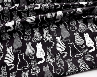 Tela de gatos en blanco y negro: Tela de tapicería con estampado animal cortada a medida