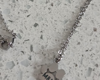 Silver or Gold petite paw print - plain or engraved with an initial - honour a beloved pet - gift idea