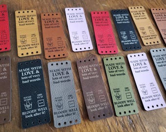 Fun large tags -Made with Love & lots of very bad words -2 bottom choices - sold in sets of 5 - 3" x 1.1" with sew holes