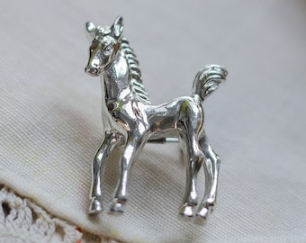 Small vintage silver tone pony brooch Shiny horse pin