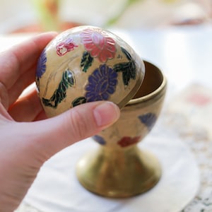 Vintage brass enamel egg trinket box Easter egg shelf decoration Floral pedestal egg figurine
