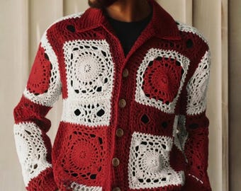 May include: A red and white crochet cardigan with a button-up front. The cardigan has a square pattern with a circular design in the centre of each square. The sleeves and collar are red, and the buttons are brown.