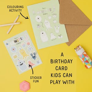 May include: A birthday card set for kids with a monster theme. Includes a card, stickers, and coloring activity. The card has the text "Have a Monster Birthday" and features monster illustrations. The set is on a yellow background.