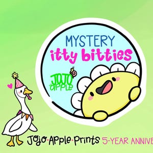 May include: A circular sticker featuring the text MYSTERY itty bitties in blue and pink, a yellow flower character, and the logo JOJO APPLE with a snail. A white goose wearing a party hat and bunting stands nearby with the text JOJO APPLE PRINTS 5-YEAR ANNIVERSARY.