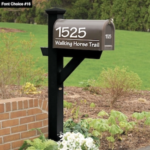 May include: A brown mailbox with a black post and a white address number "1525" and street name "Walking Horse Trail".