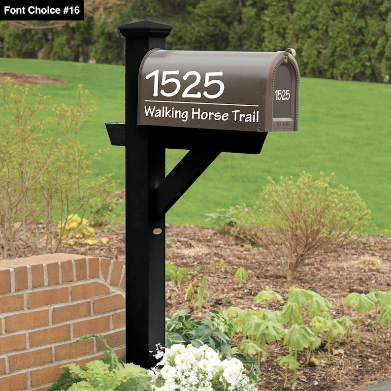 May include: A brown mailbox with a black post and a white address number "1525" and street name "Walking Horse Trail".