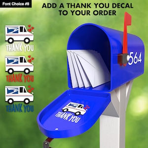 May include: A blue mailbox with a white post and a red flag. The mailbox has a decal on the front that says "THANK YOU" with a cartoon image of a mail truck and hearts. The mailbox has the number 564 on the side.