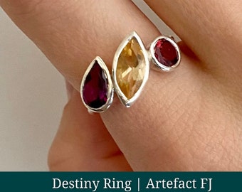 Unique gemstone cluster ring featuring marquise citrine and garnet in a sterling silver ring band.  Gift for you, daughter or girlfriend.