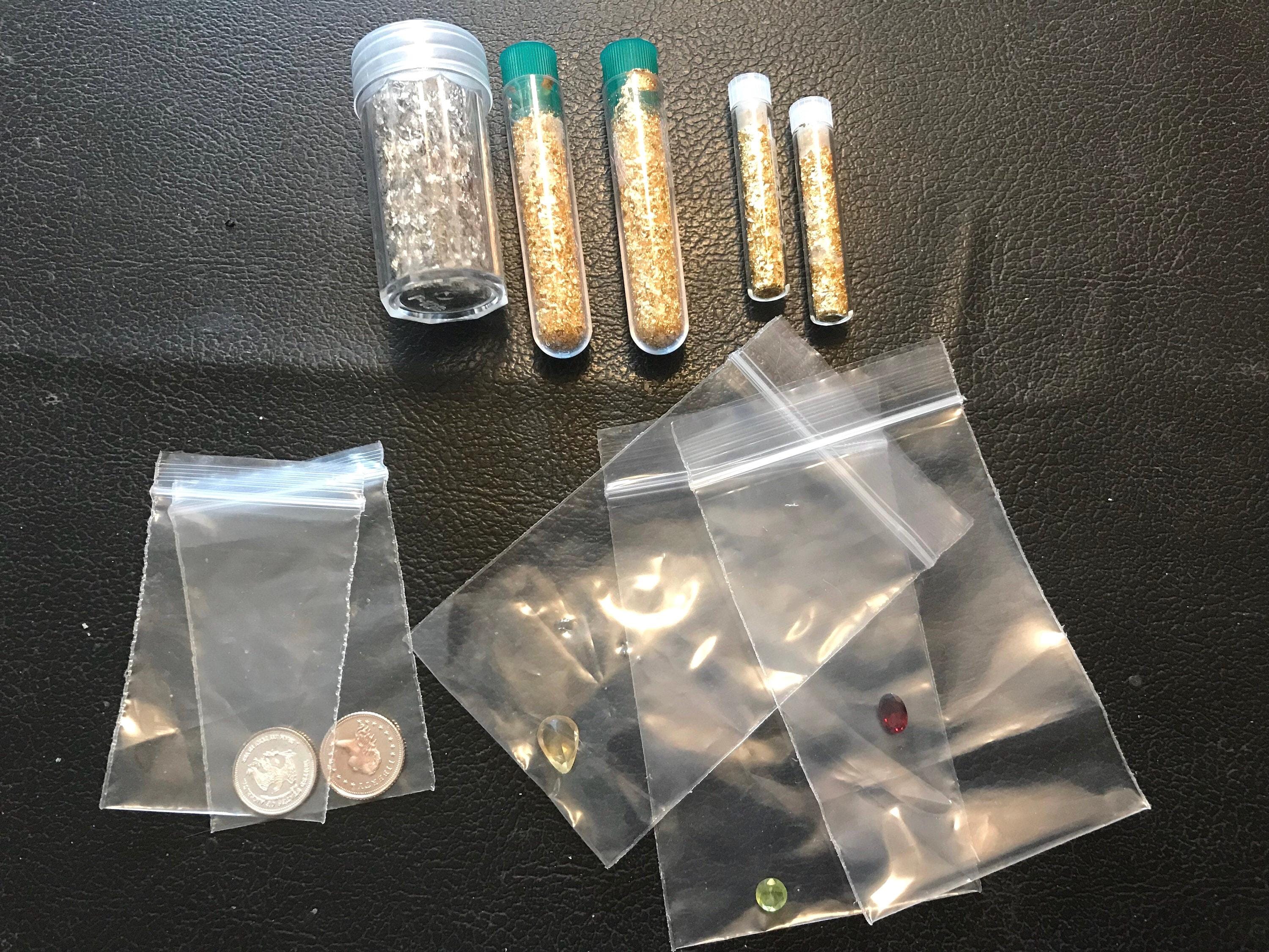 Gold and Silver Flakes With 3 Precious Stones And 2 Silver Coins