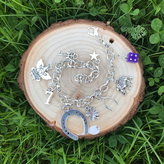 Silver lucky charm bracelet deals