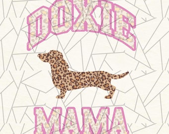 May include: A digital download graphic featuring a dachshund silhouette with a leopard print pattern. The text "DOXIE MAMA" is in pink with a white outline and a distressed look.
