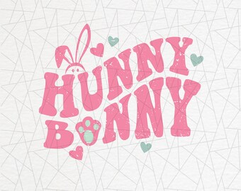 May include: Pink and green graphic design with the text "Hunny Bunny" in a distressed font. The design features a bunny rabbit head with ears and a paw print.