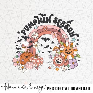 May include: A colorful rainbow with the text "Pumpkin Season" in a retro font. The rainbow is surrounded by bats, stars, flowers, pumpkins, and a spider.
