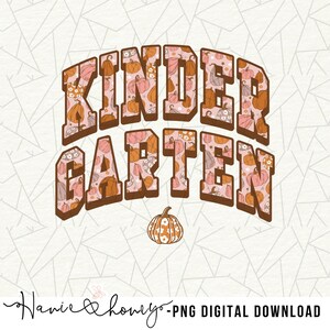 May include: A brown and orange "Kindergarten" sign with a pumpkin pattern. The text is in a bold, blocky font. A small pumpkin with a floral pattern is below the sign.
