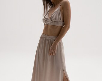 Armani silk two pieces set of midi skirt and bra top in golden beige color