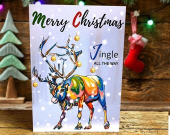 Jingle All The Way - Carte de Noël très colorée d’un renne avec des cloches dans ses bois