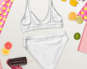 Eco-friendly high-waisted swimsuit bottoms with removable pads and comfortable double-layered construction, perfect for the pool or beach.