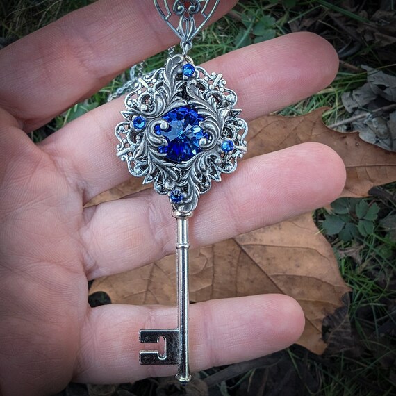Sapphire key necklace deals