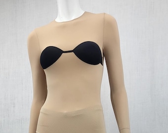 Set composto da reggiseno, body e leggings a rete Trompe L'Oeil di Maison Martin Margiela x H&M.