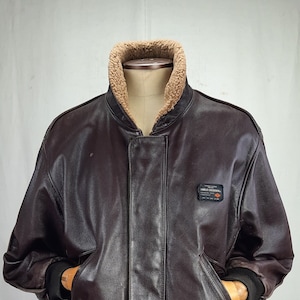 Blouson aviateur Charles Chevignon en cuir vintage