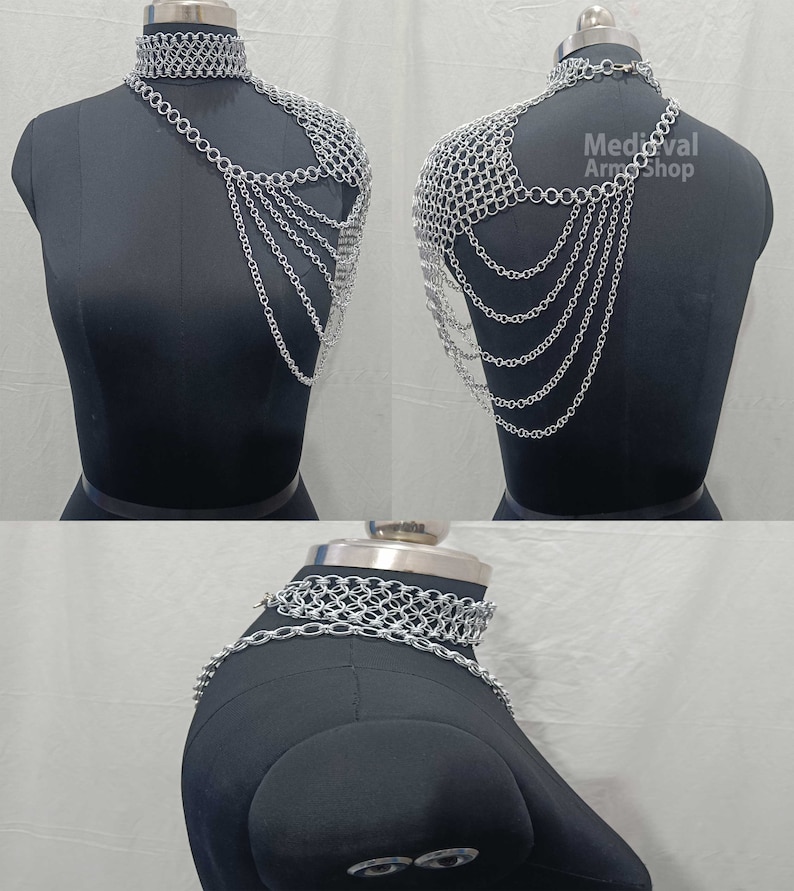 May include: Silver chainmaille shoulder armor with a matching choker necklace. The armor is made of interlocking metal rings and has a flowing, draped design.  Medieval Armor Shop.