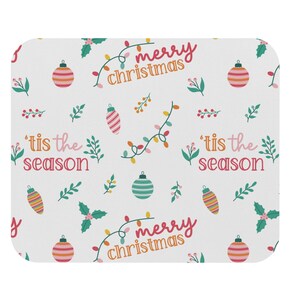 May include: A white background with a repeating pattern of Christmas ornaments, lights, and greenery. The text "merry christmas" and "'tis the season" is repeated throughout the pattern.
