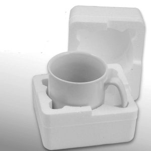 May include: A white ceramic mug with a handle, packaged in a white styrofoam box.