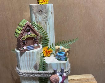 Lending a helping head. Landscape timber/solar light lawn decor