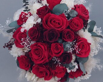 A dream of red roses/bridal bouquet of dried flowers with stabilized roses