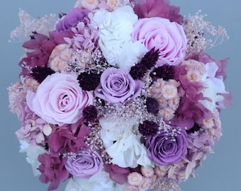 Small bridal bouquet/ civil ceremony made of dried flowers in pastel shades with preserved roses