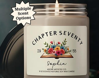 May include: A beige soy wax candle in a glass jar with a lid. The label reads "Chapter Seventy" with a floral design and the name "Sophia." The candle is 9 oz and has multiple scent options.