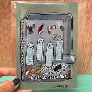 Personnalisez votre boîte de conserves de sardines : carte postale et autocollants