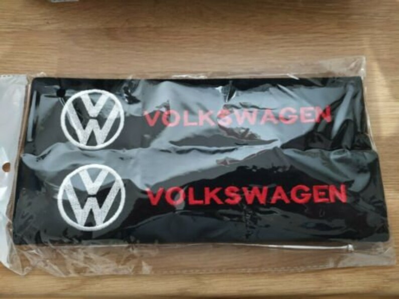 Seat Belt Pads avec brodé Eat Sleep VW Logo en ORANGE. 