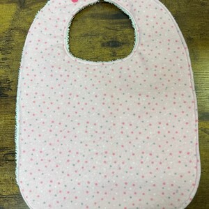 ピンクの防水特別支援幼児用よだれかけ