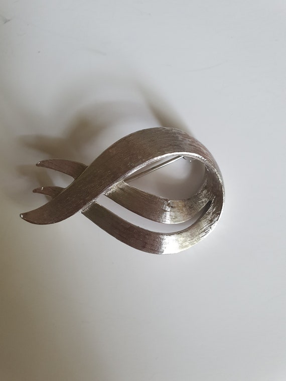 Monet silvertone swirl brooch pin