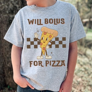 May include: A gray t-shirt with a cartoon pizza slice wearing a chef's hat and holding a pizza cutter. The text on the shirt reads "Will Bolus For Pizza".