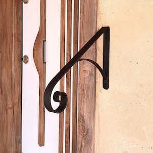 Handmade Wrought Metal Handrail: Mid-Century Modern Grab Bar