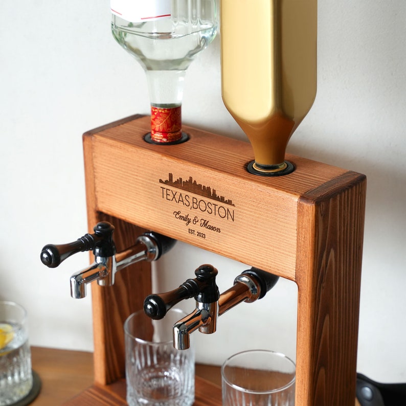 a close up of a drink dispenser on a table