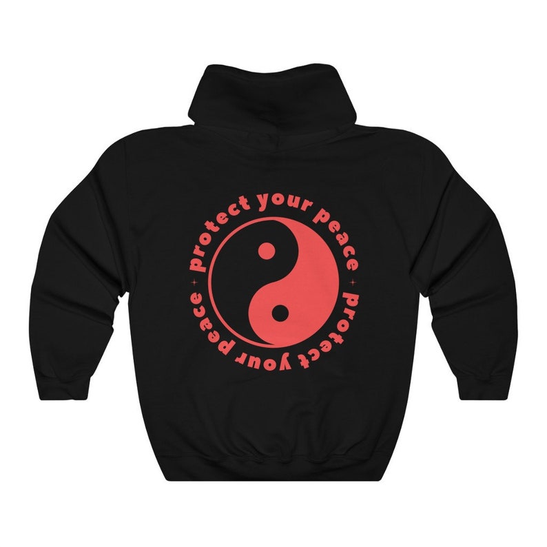 May include: Black hooded sweatshirt with a red yin yang symbol and the text "Protect your peace - protect your peace" in a circle around it.