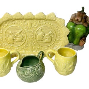 Yellow Bordallo Rabbit Sandwich Tray 13” (chip present outer front edge), Set of 2 Yellow 4” Mugs.